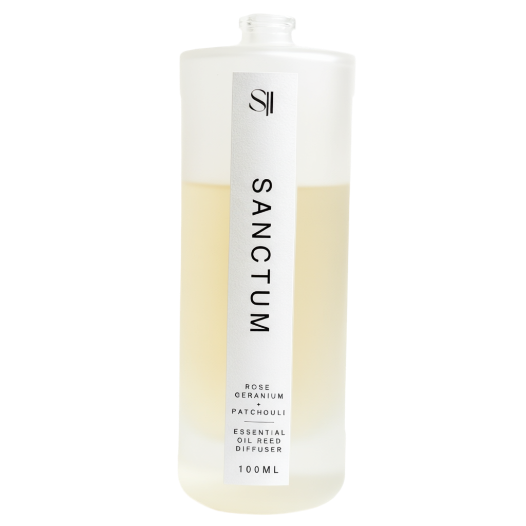 Sanctum essential oil reed diffuser bottle on a white background