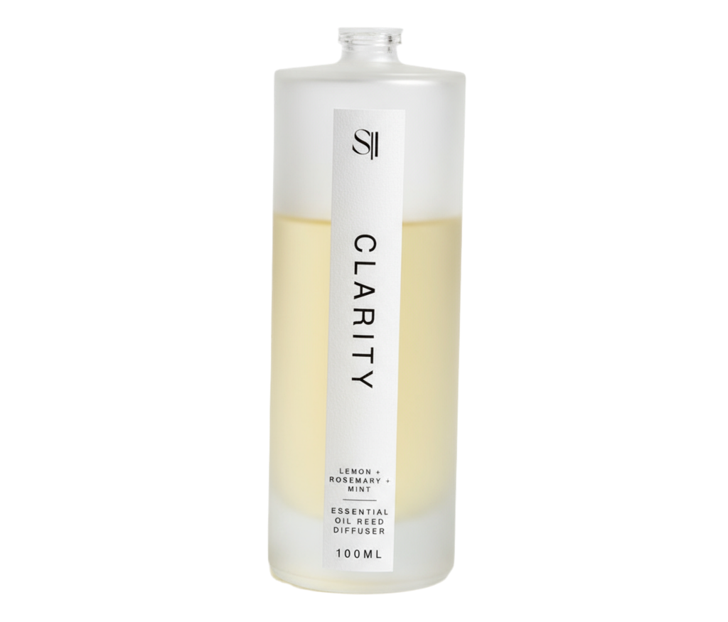Bottle of 'Clarity' essential oil diffuser on a white background